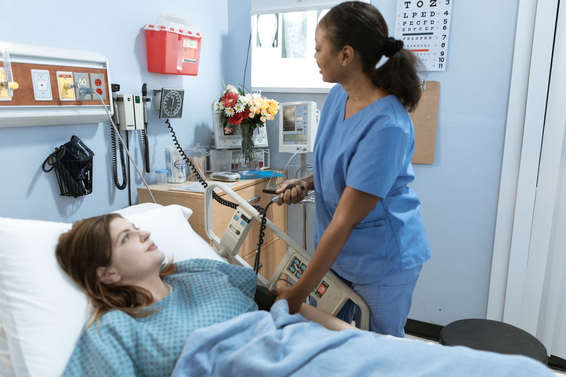 Internal medicine clinician checking a patient's blood pressure